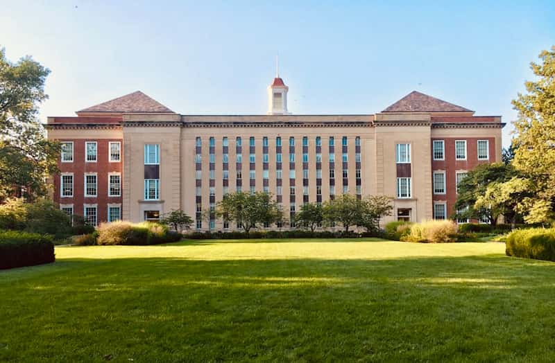 Institutional headquarters campus set across a formal lawn